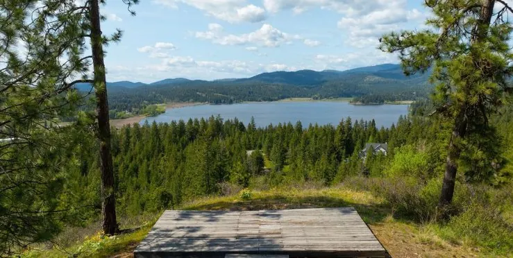 Hauser Lake hilltop deck lake view acreage